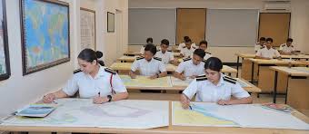 Students taking notes in a modern classroom setup. Focus on education and academic success.