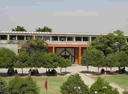 Panoramic view of a Merchant Navy training institute with lush green grounds and modern facilities.
